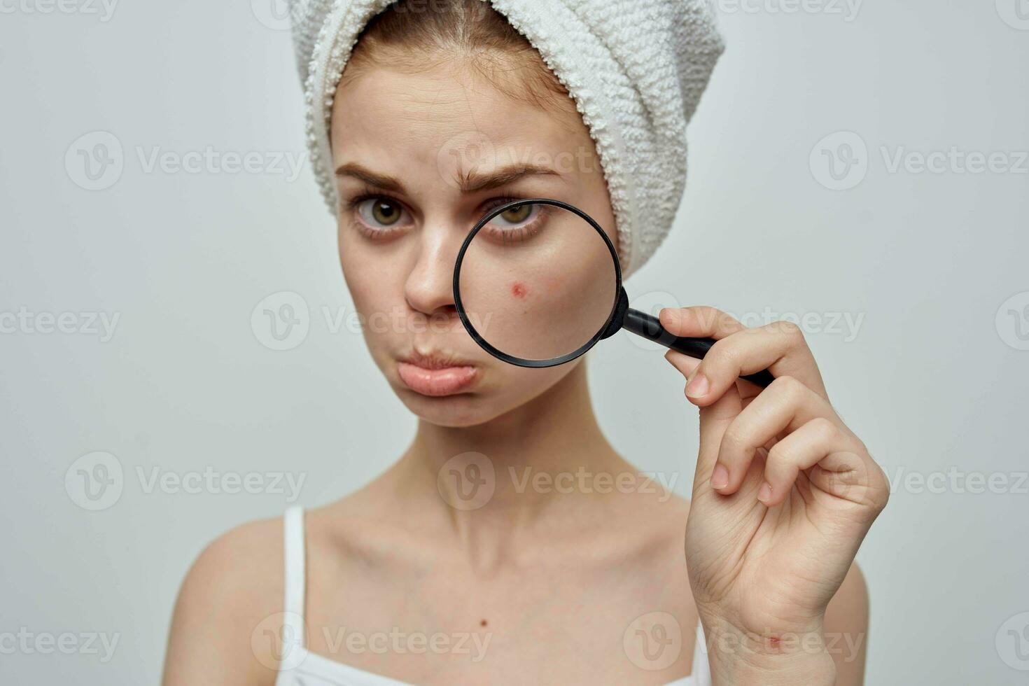 beautiful woman with a pimple on the face skin problems close-up photo