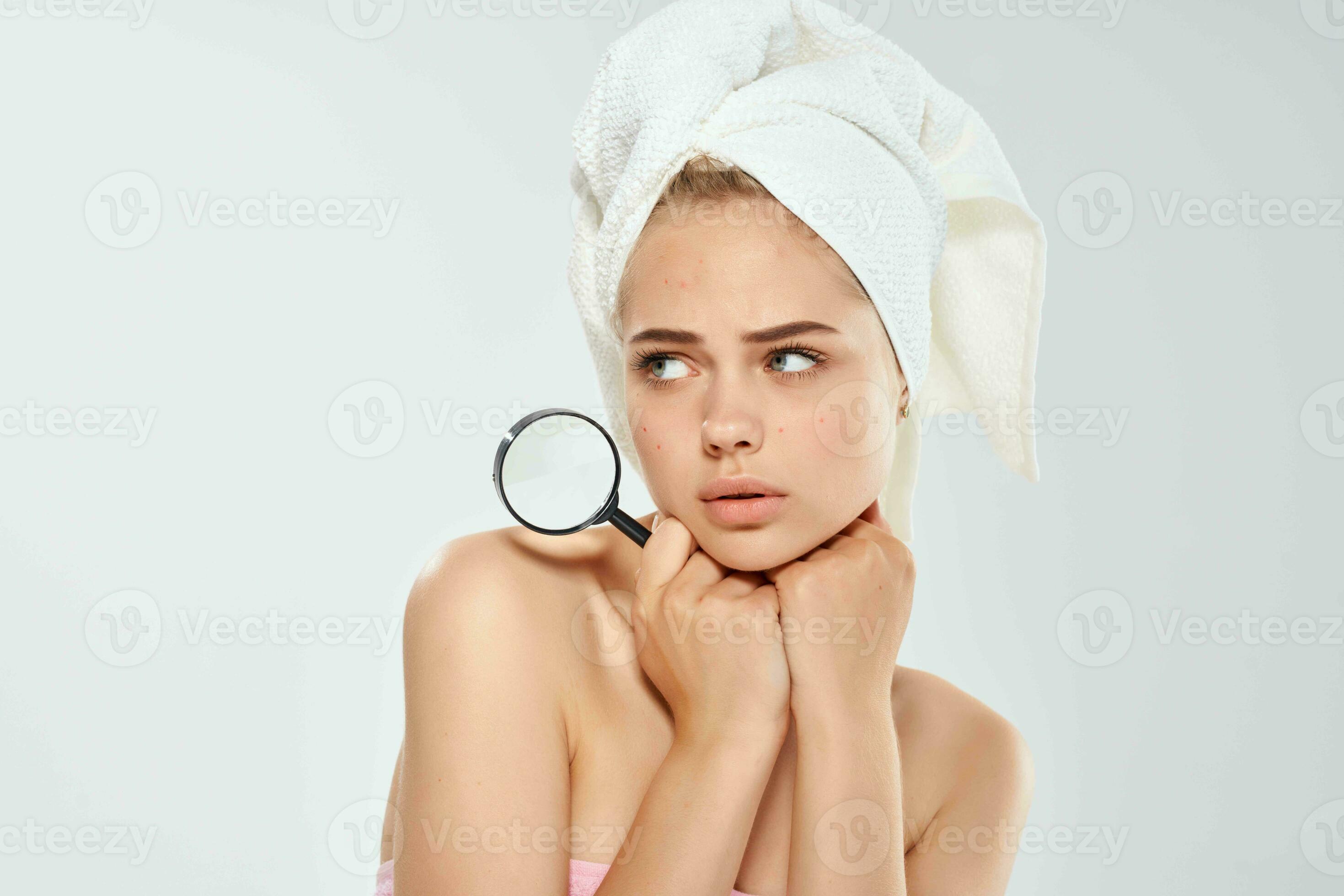 woman with bare shoulders clean skin magnifying glass in hands 23764352