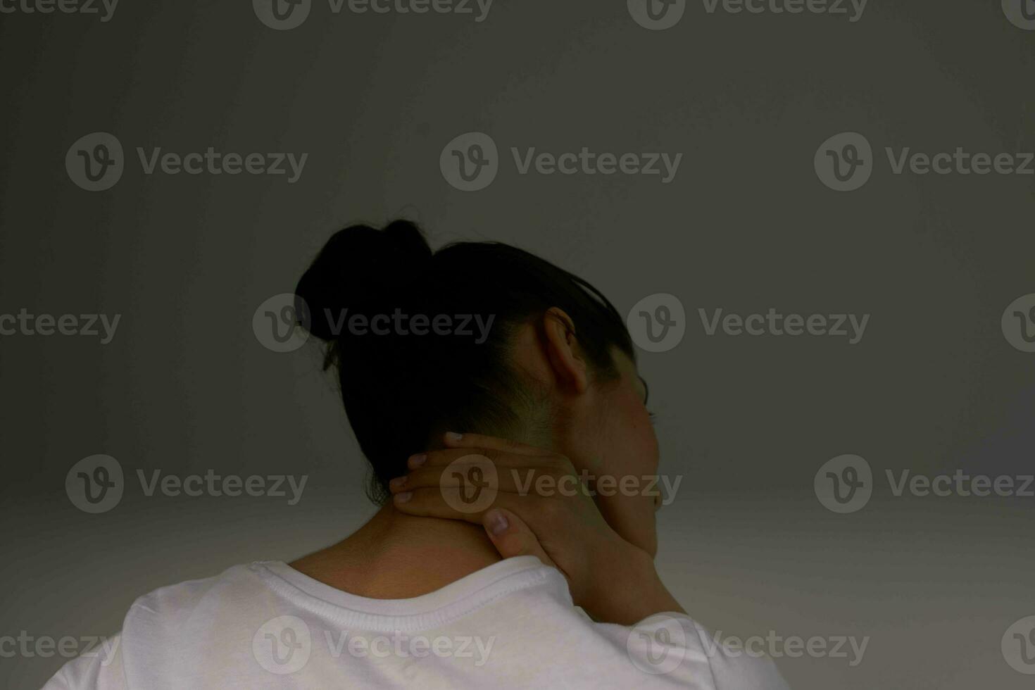 Woman with neck pain photo