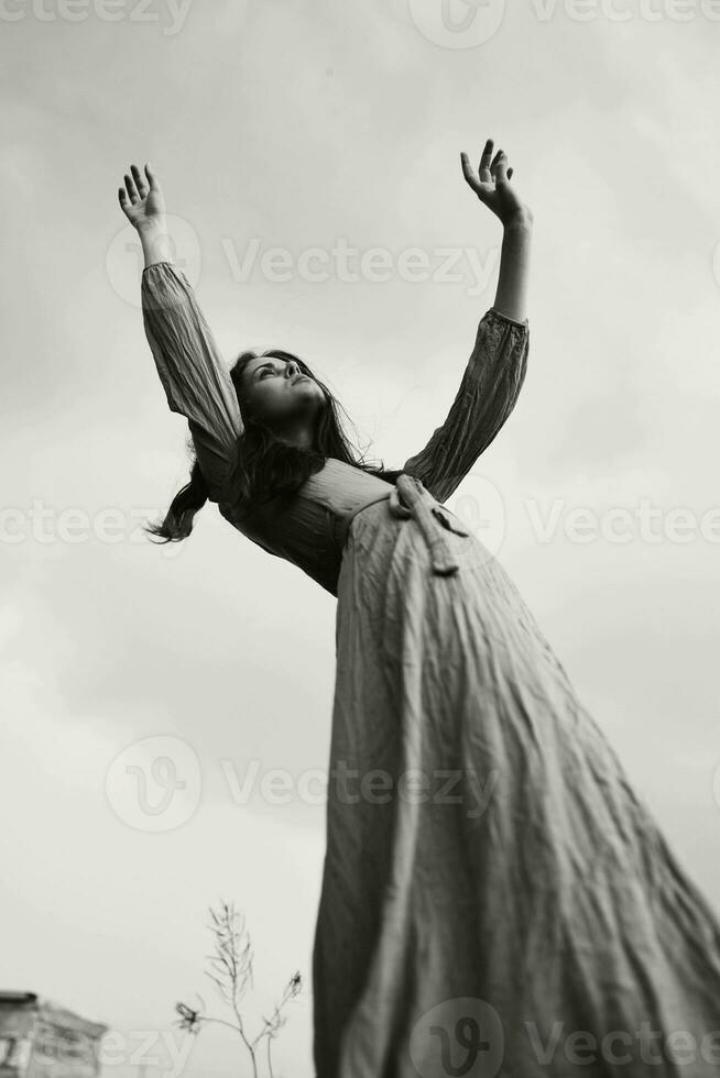 beautiful woman in dress dramatic style emotions posing black and white photo