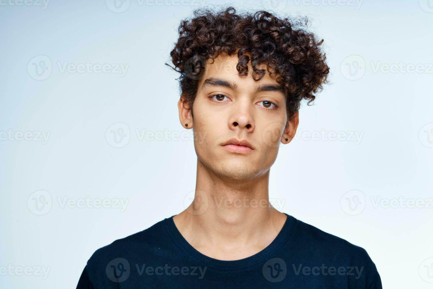 cute guy curly hair black t-shirt close-up model photo