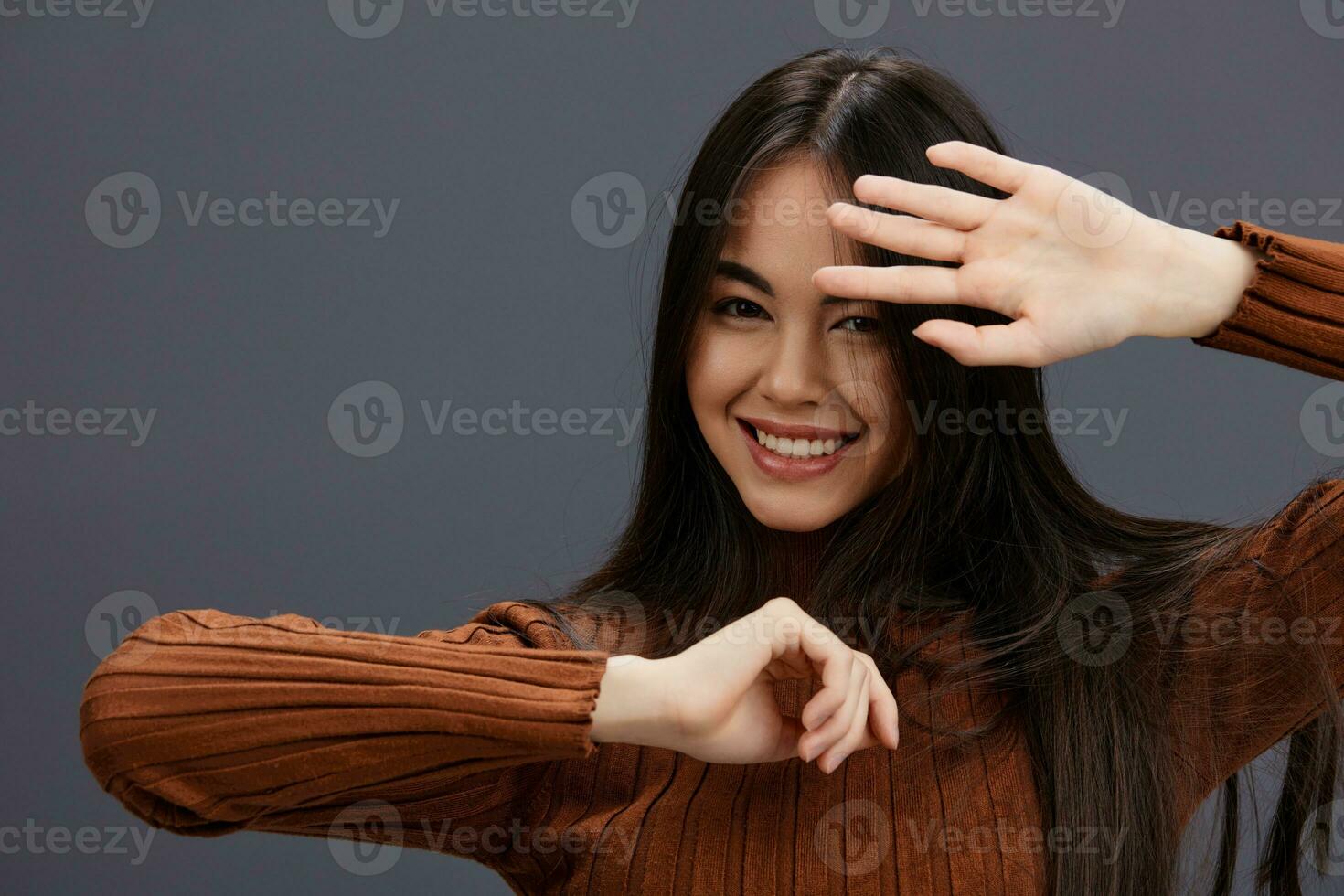 pretty woman fun brown sweater posing casual wear Lifestyle photo