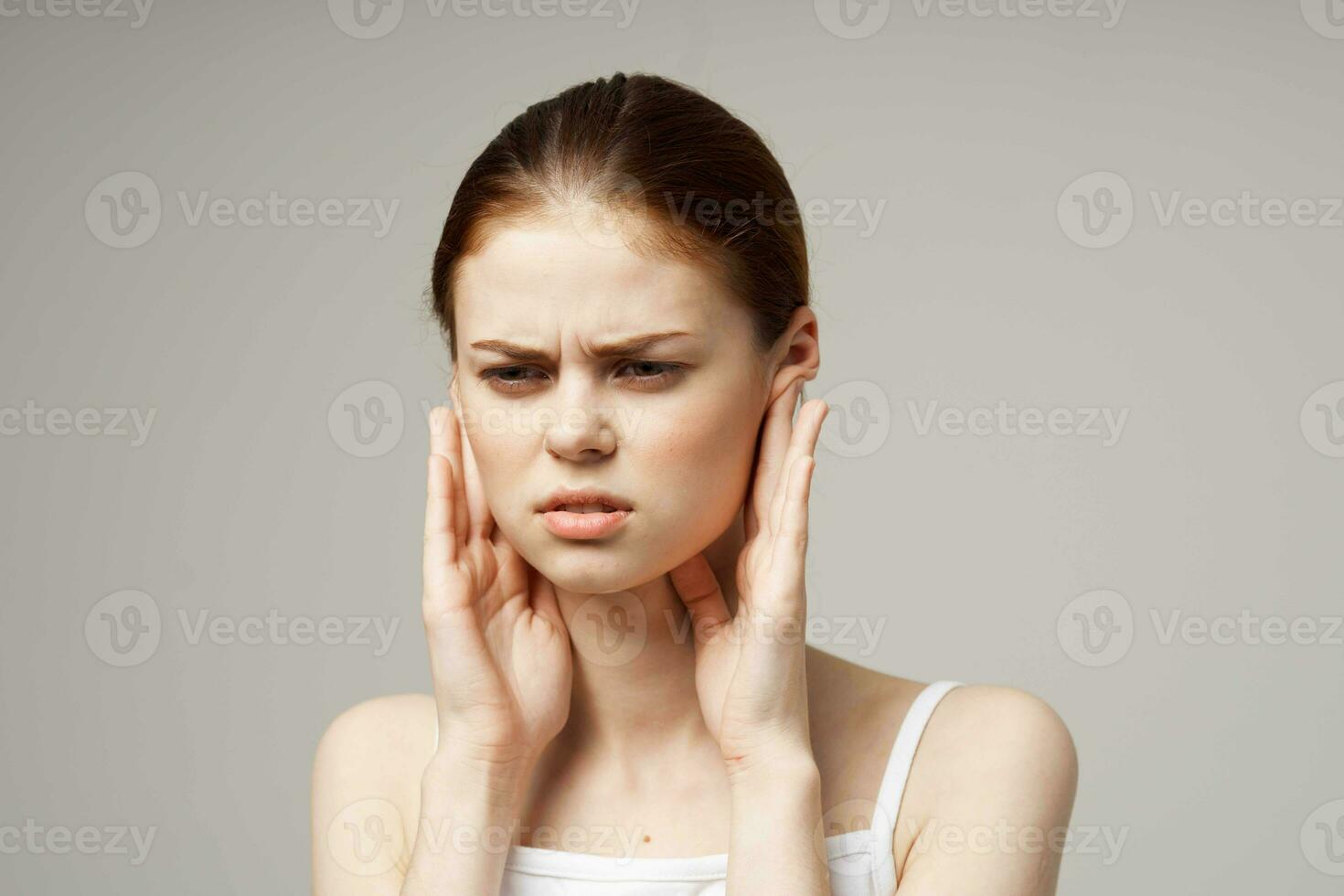 woman ear pain health problem dissatisfaction studio treatment photo