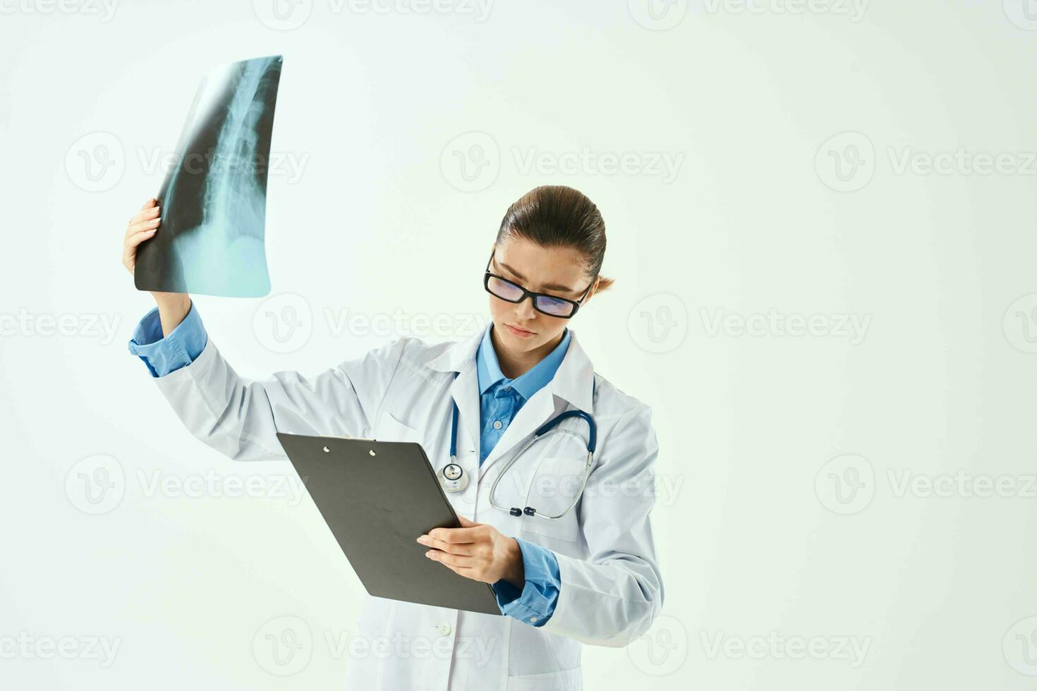 female doctor medical gown x-ray diagnostics laboratory hospital photo