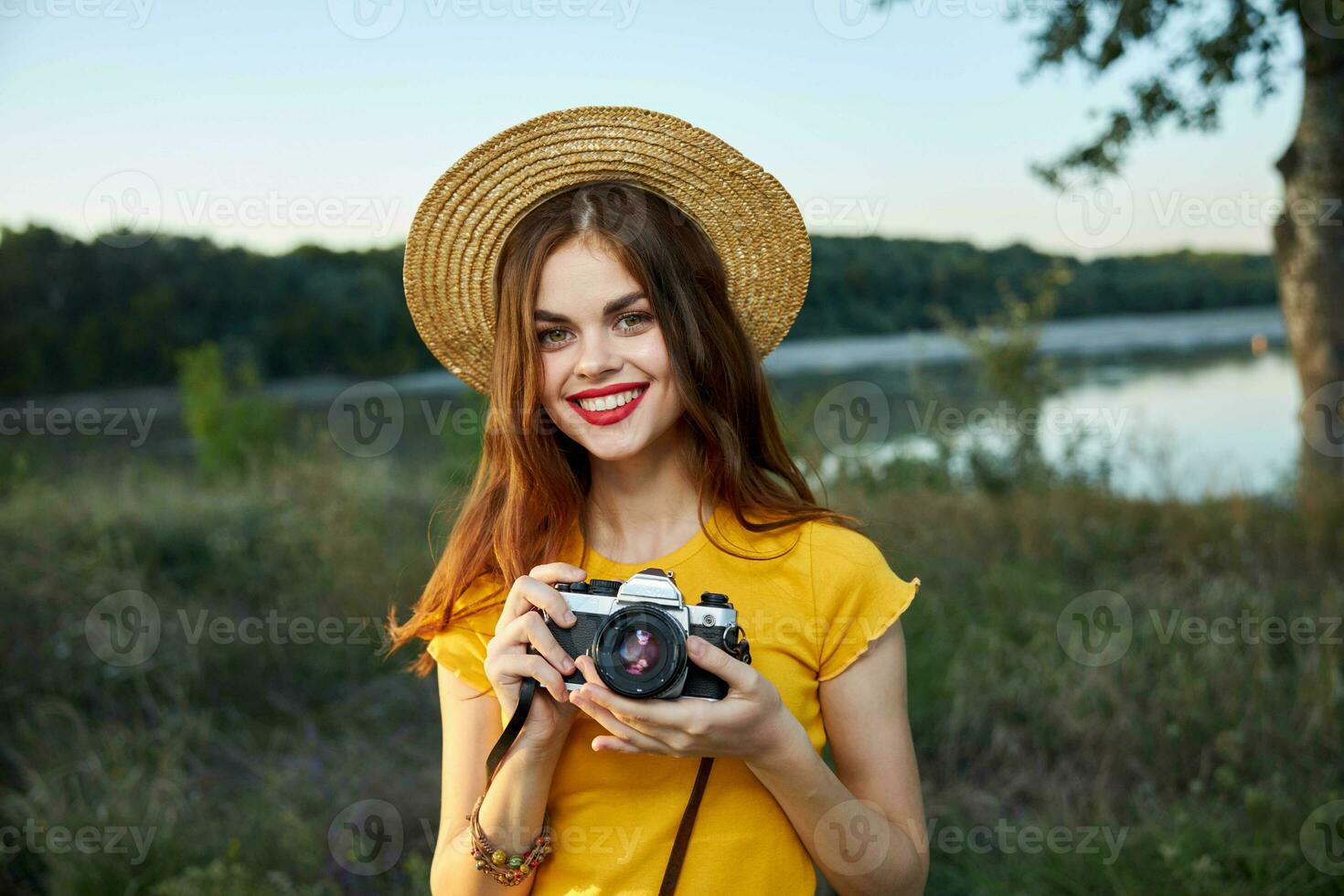 woman photographer red lips camera nature summer hobby photo