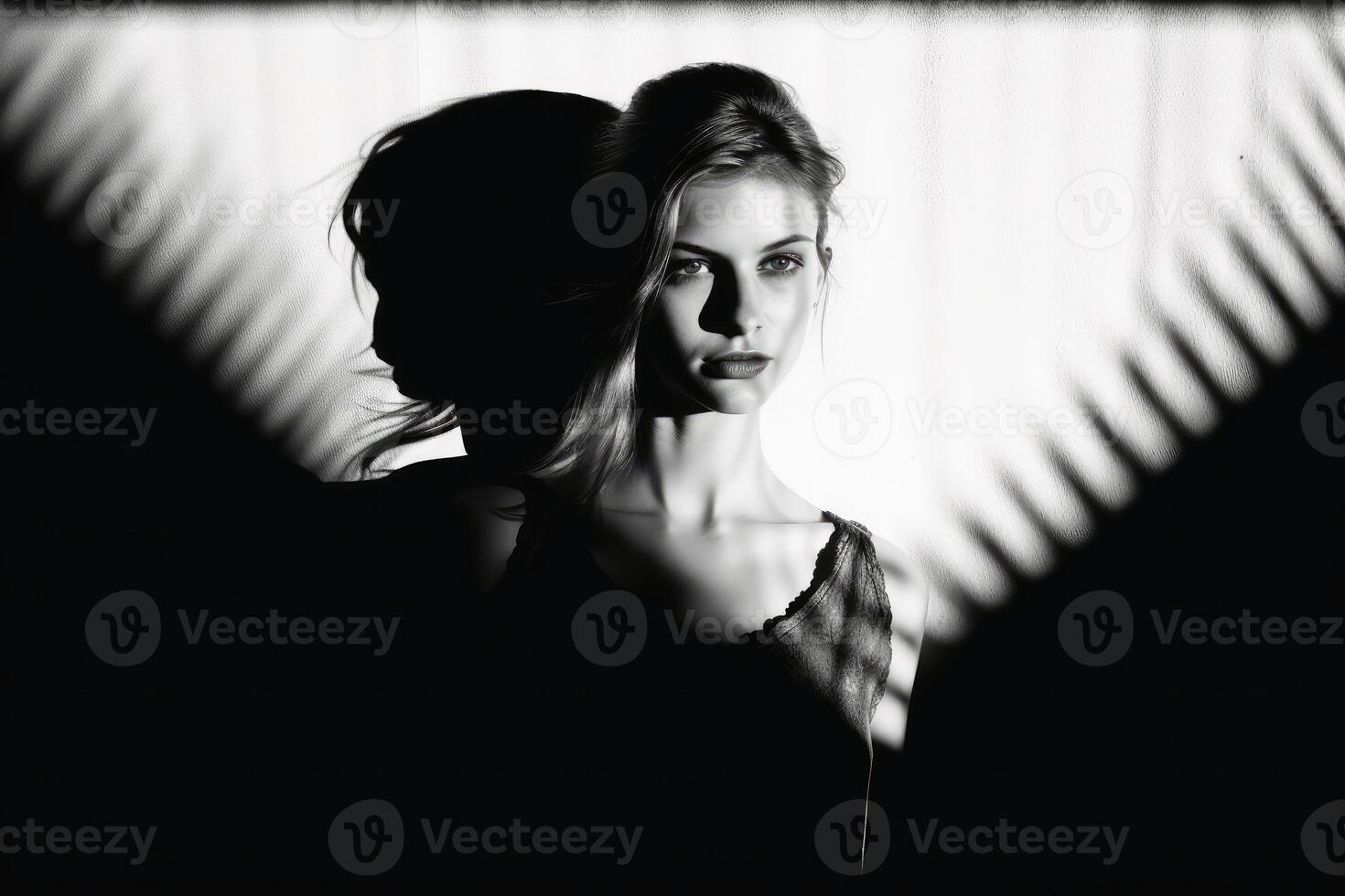 A Woman in light and shadow in black and white created with technology. photo