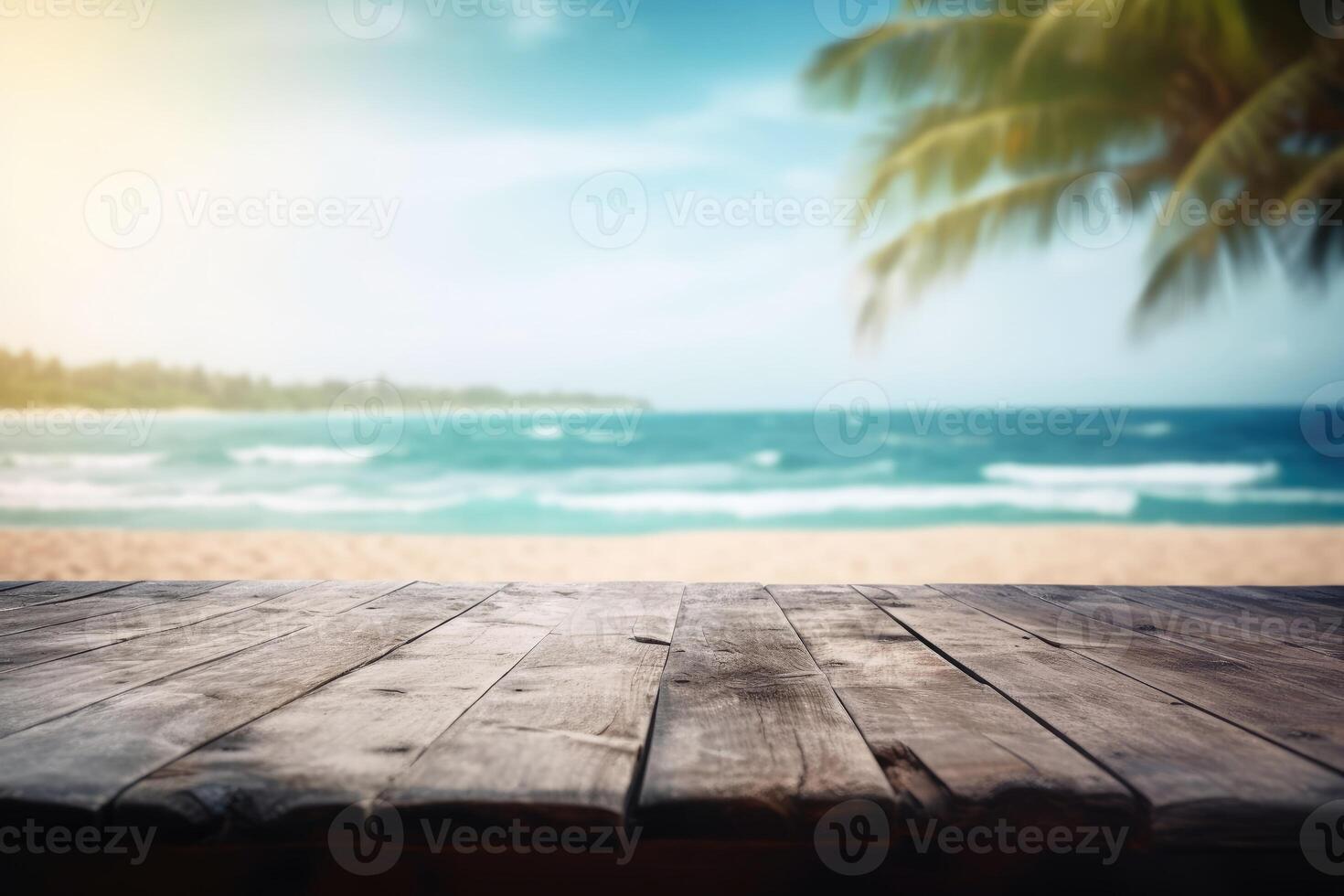 An empty wooden table at a tropical beach with a soft bokeh background created with technology. photo