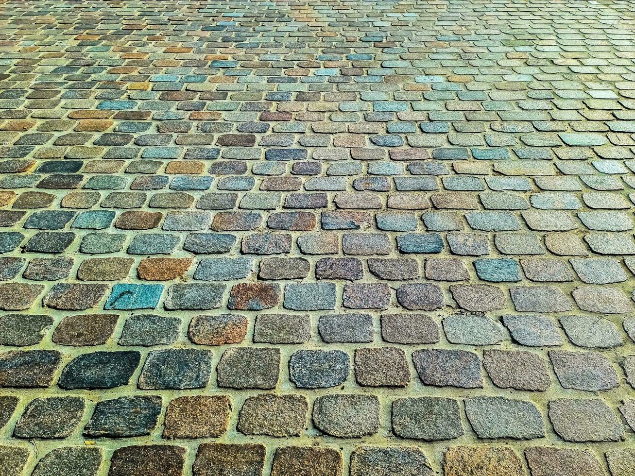 Detailed close up on old historical cobblestone roads and walkways photo