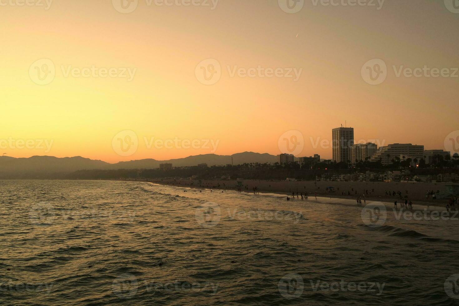 Santa Monica coast in California at sunset photo