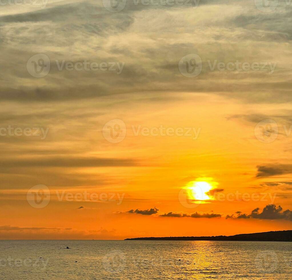 Sunset over the sea on a late summer day photo