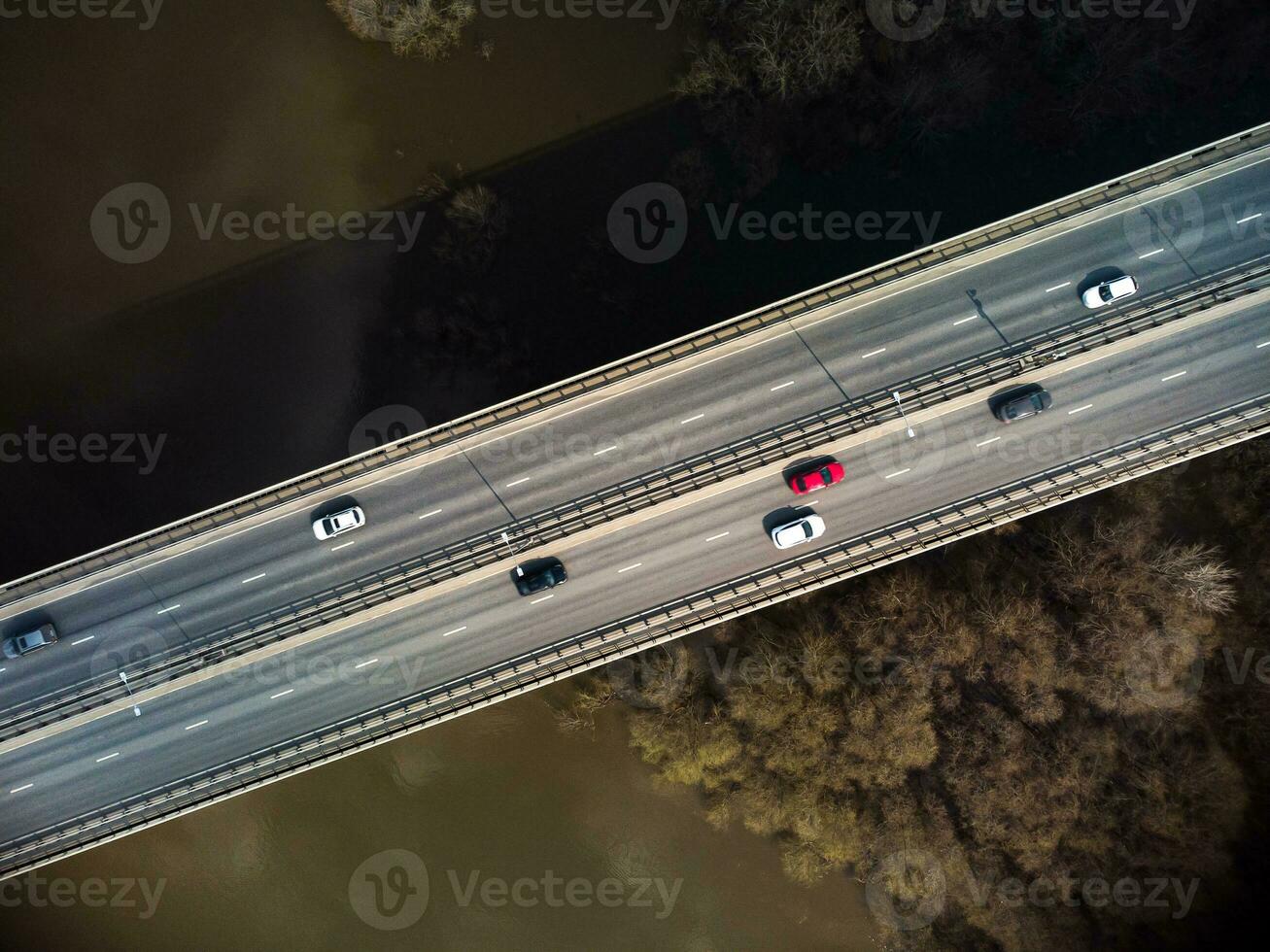 A road bridge over the river, taken from a quadrocopter. photo