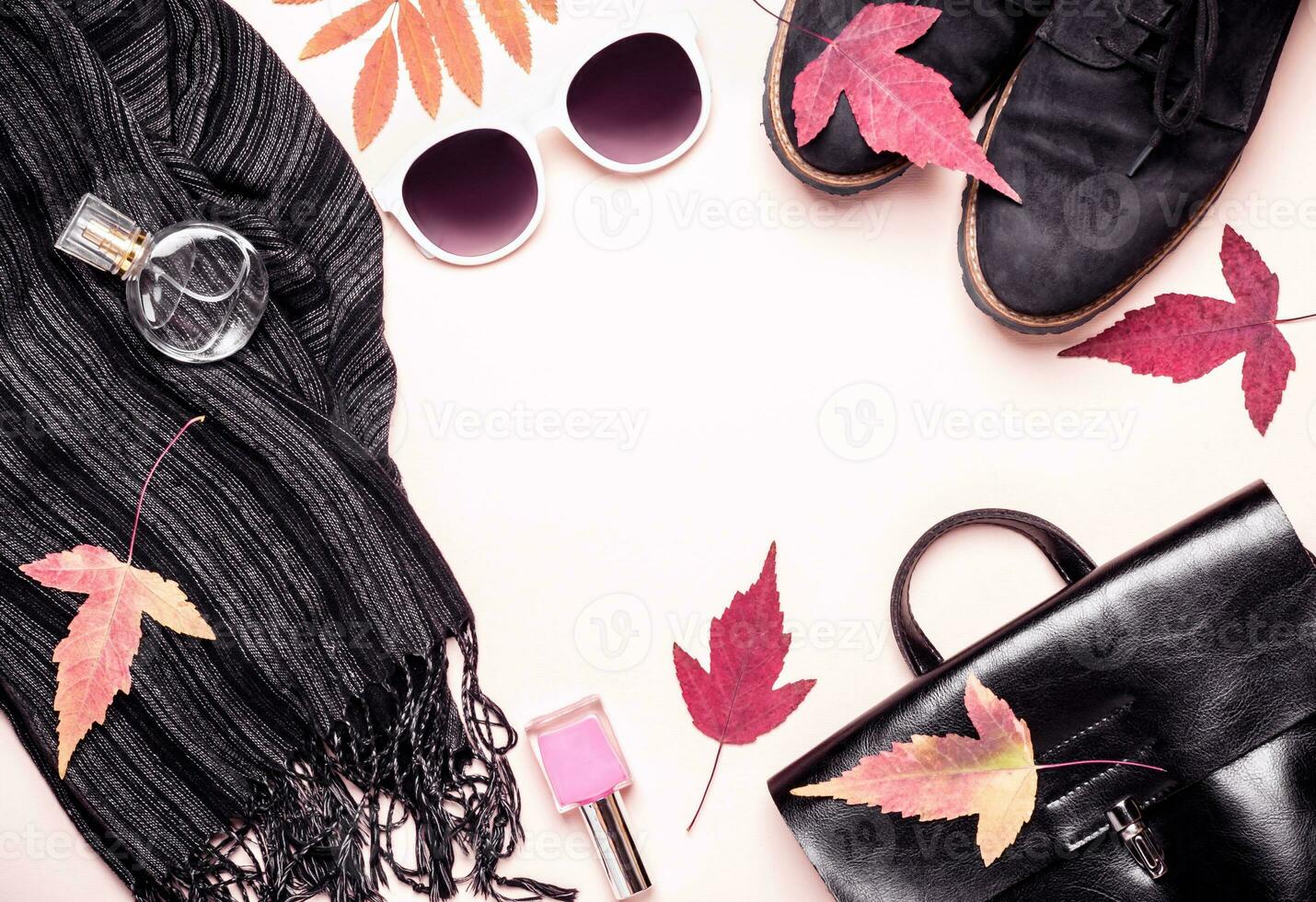 female fashion autumn accessories, shoes and handbag on pastel color background. Beauty and fashion concept photo