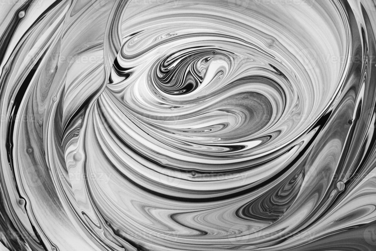 Black and white waves on gray fusion of colors. Fluid Art. Abstract marble background or texture photo