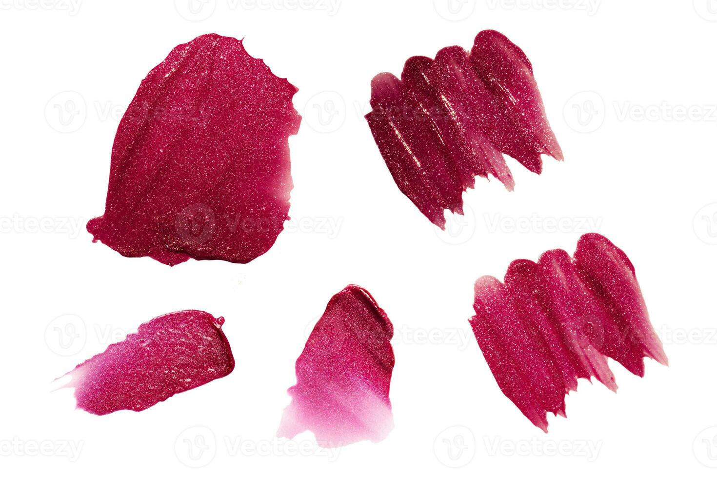 Bright pink shimmer lipstick strokes. Isolated on white background photo