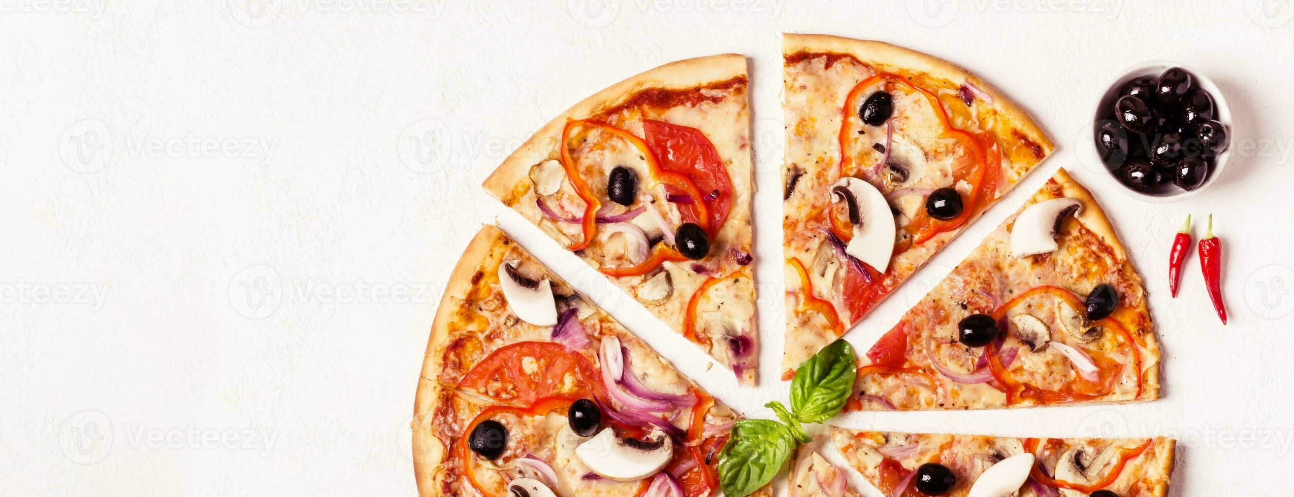 Vegetarian pizza pieces with mushrooms and olives on white background photo