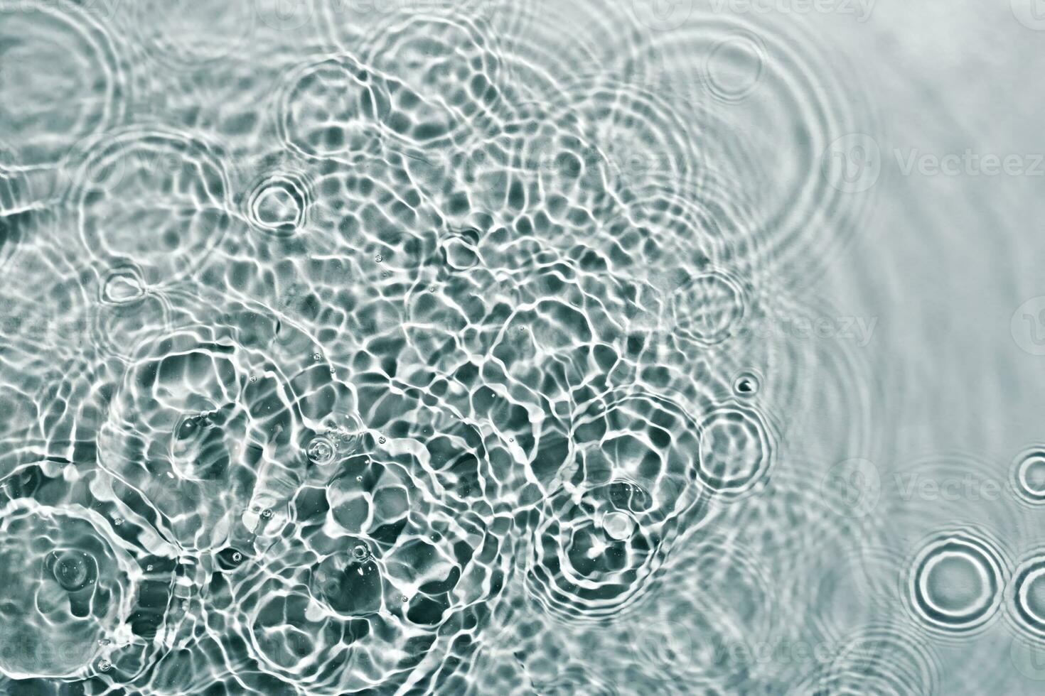 cosmético hidratante micelar agua. resumen transparente líquido antecedentes con concéntrico círculos suave atención foto