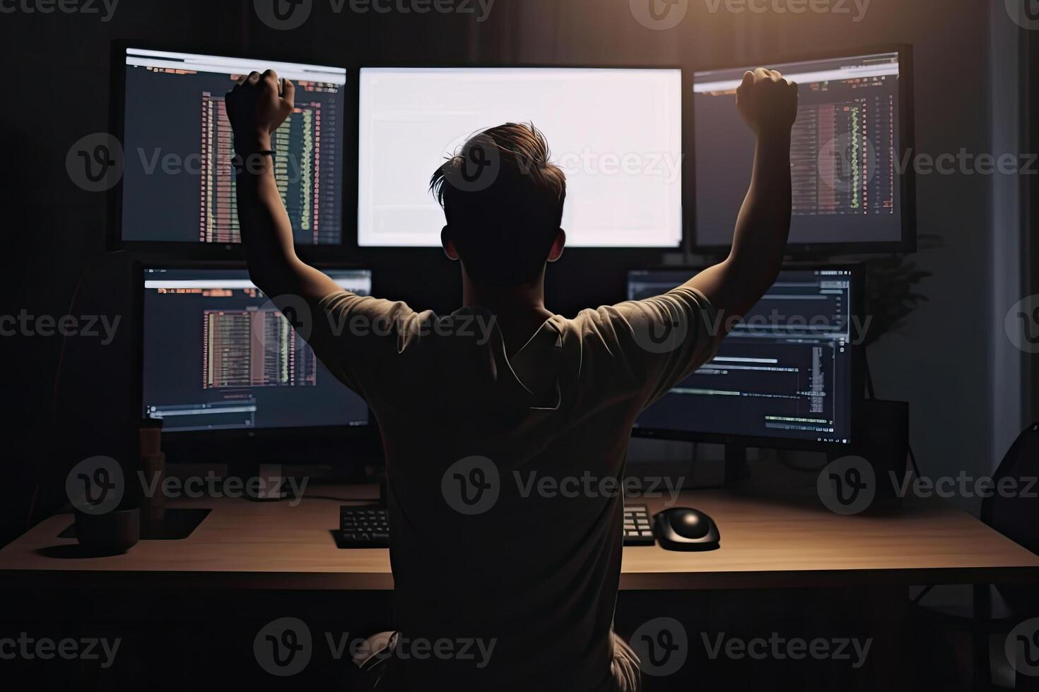 Man have fun rejoicing celebrating success while looking at laptop screen. photo