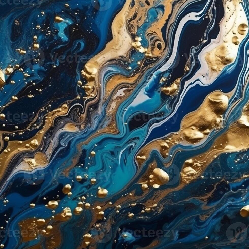 A blue and gold marble painting with gold paint. photo