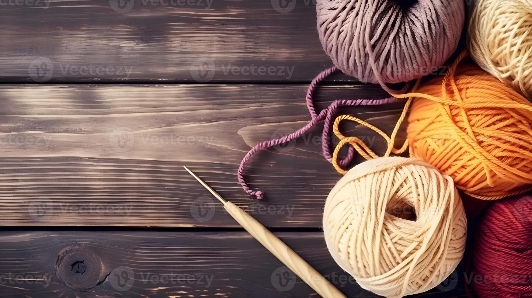 Crochet and knitting hobby. Colorful balls of yarn, knitting needles on