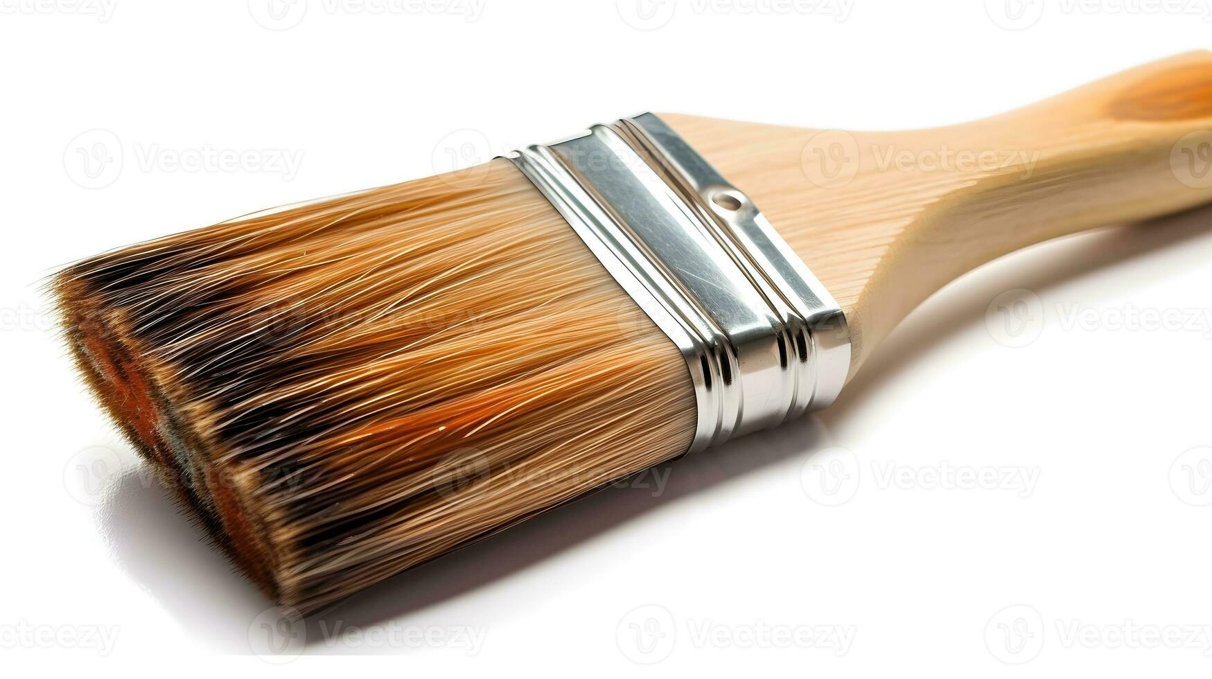 Close up of medium size paint brush isolated on white background studio shot. photo