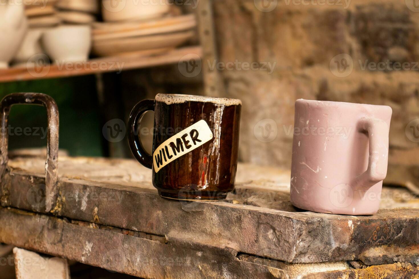 Ceramics on the elaboration process at a traditional factory at the small city of Raquira in Colombia photo