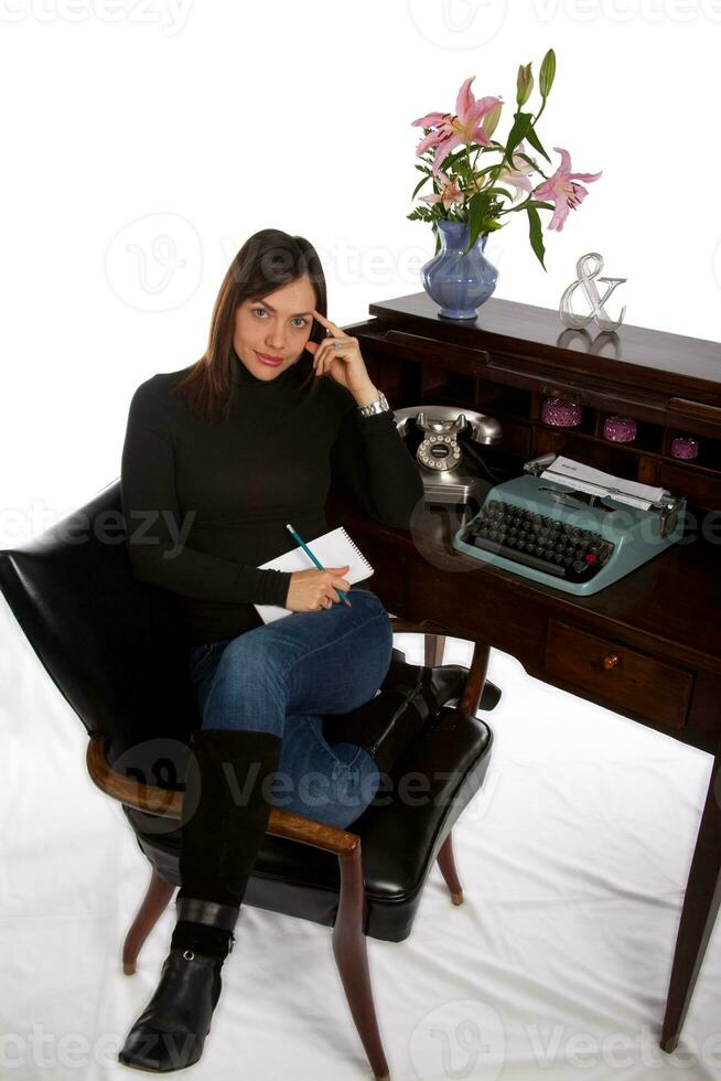 Professional woman in her thirties on white background photo