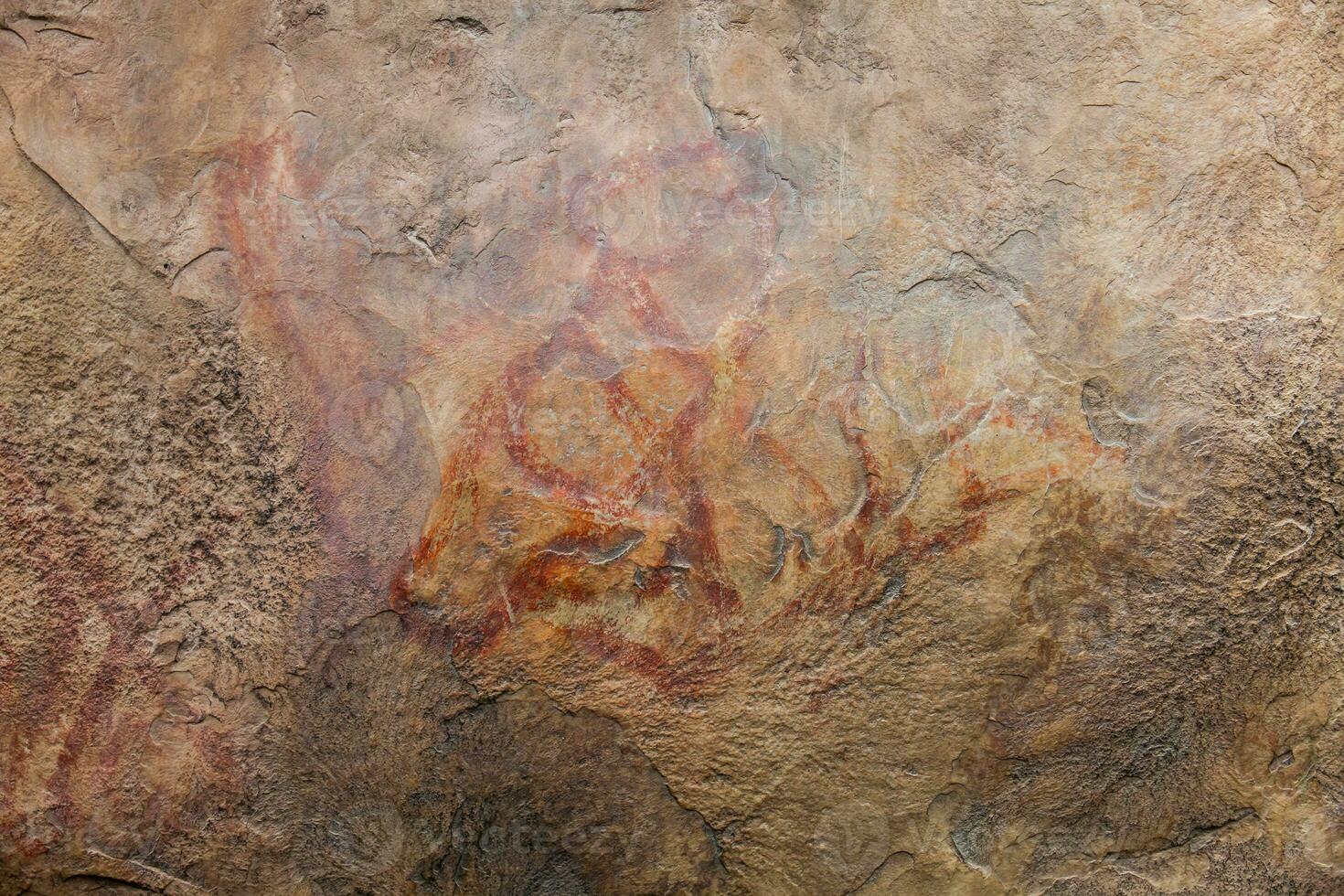 Prehistoric paintings on rock known as petroglyphs in Colombia photo