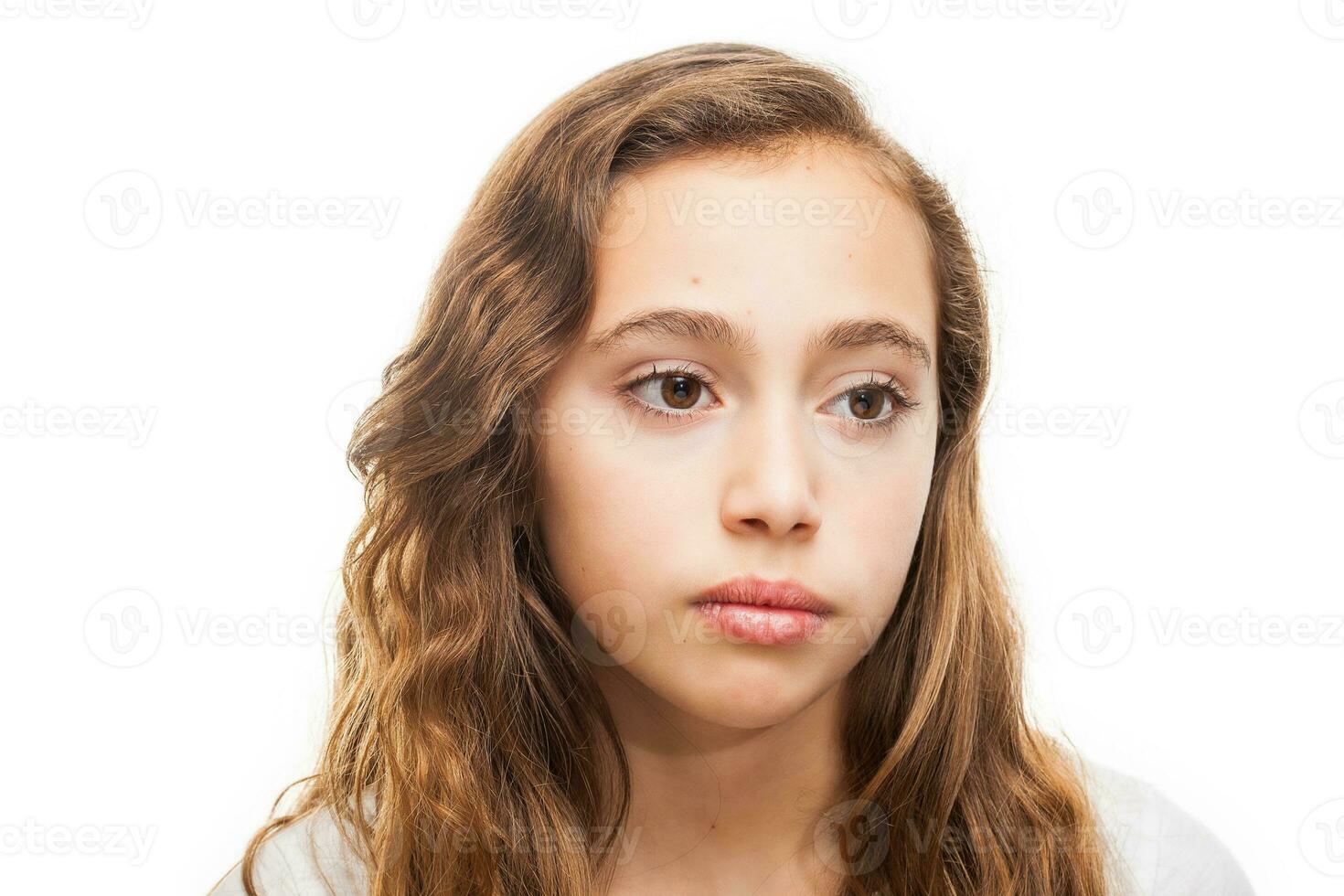 Bored and sad young girl isolated on white background photo