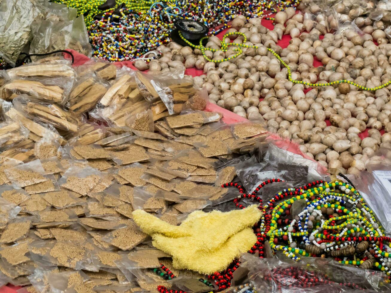 Sorcerer selling magical objects, potions and enchantments at Cali city center streets photo