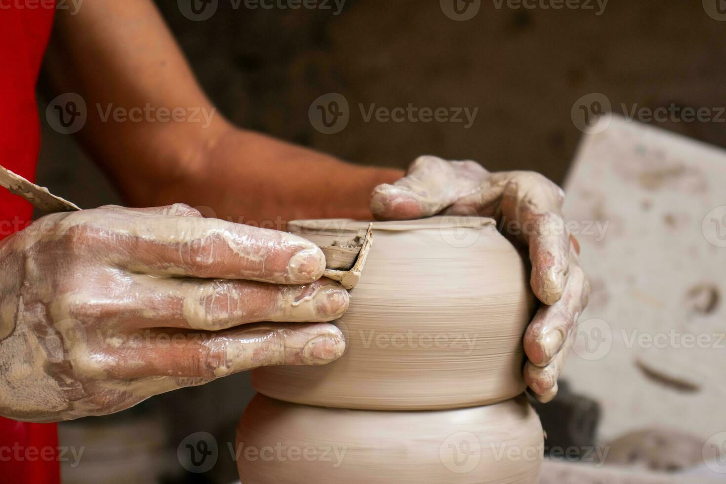 Ceramics on the elaboration process at a traditional factory at the small city of Raquira in Colombia photo