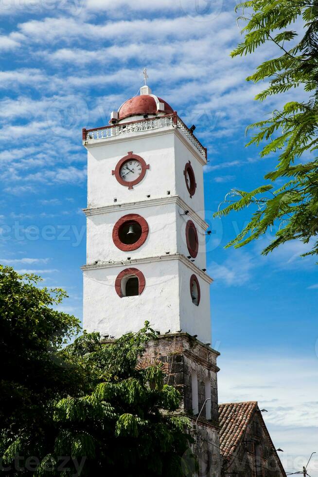 Bell tower of the San Sebastian Church built between 1553 and 1653 at the town of Mariquita in Colombia photo