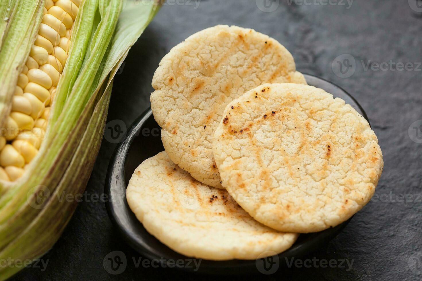 Roasted traditional South American corn arepa photo