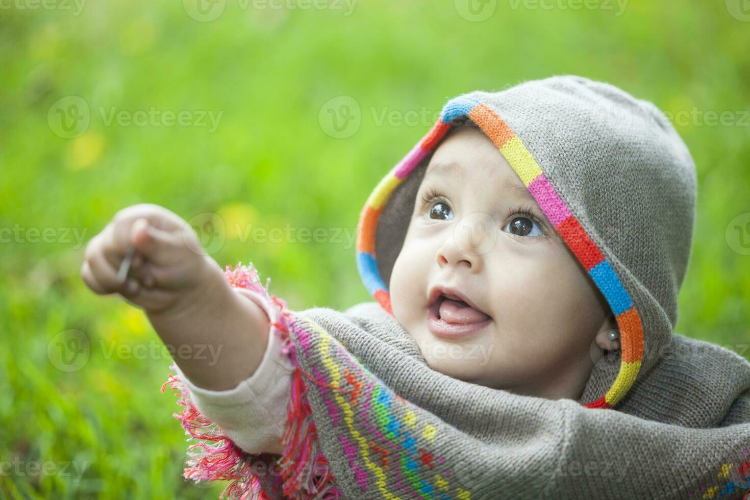 Baby girl at the garden photo