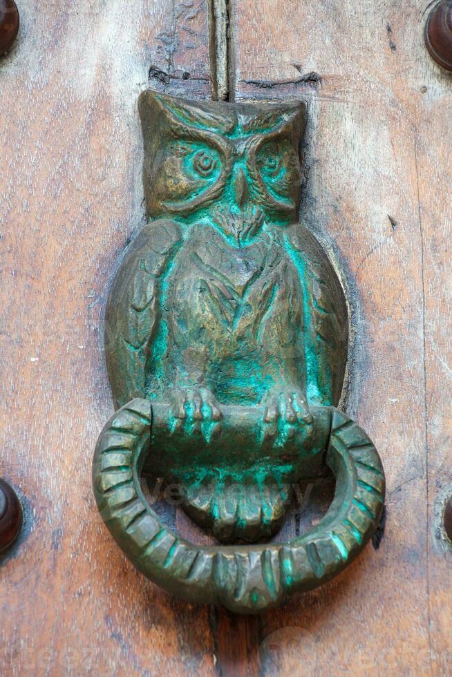 Antique door knocker in Cartagena de Indias photo