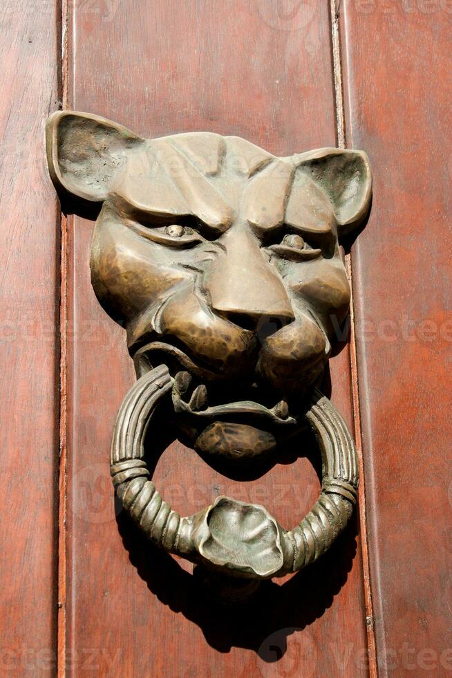 Antique door knocker in Cartagena de Indias photo