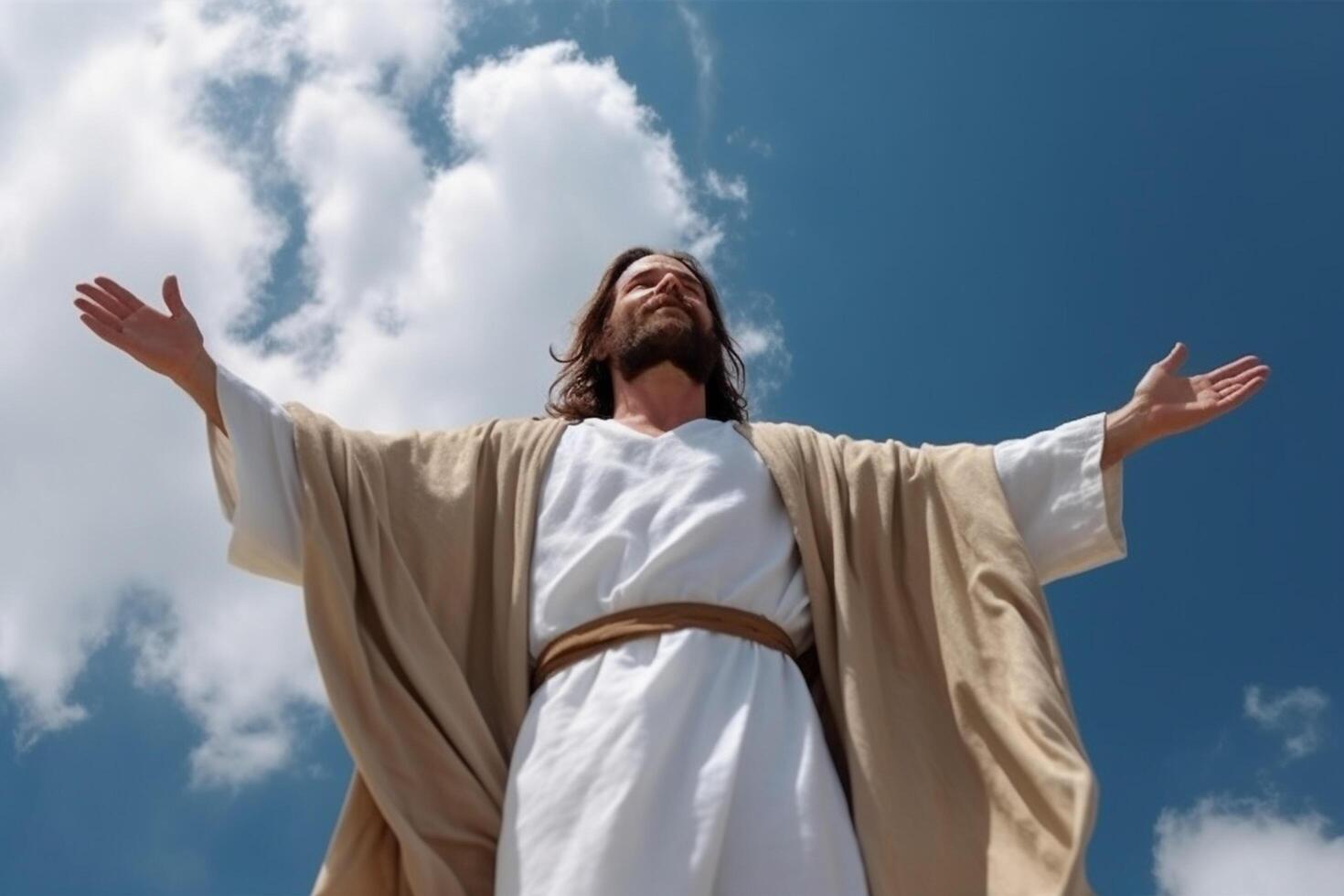 Jesus raising hands to heaven on illuminated background, photo