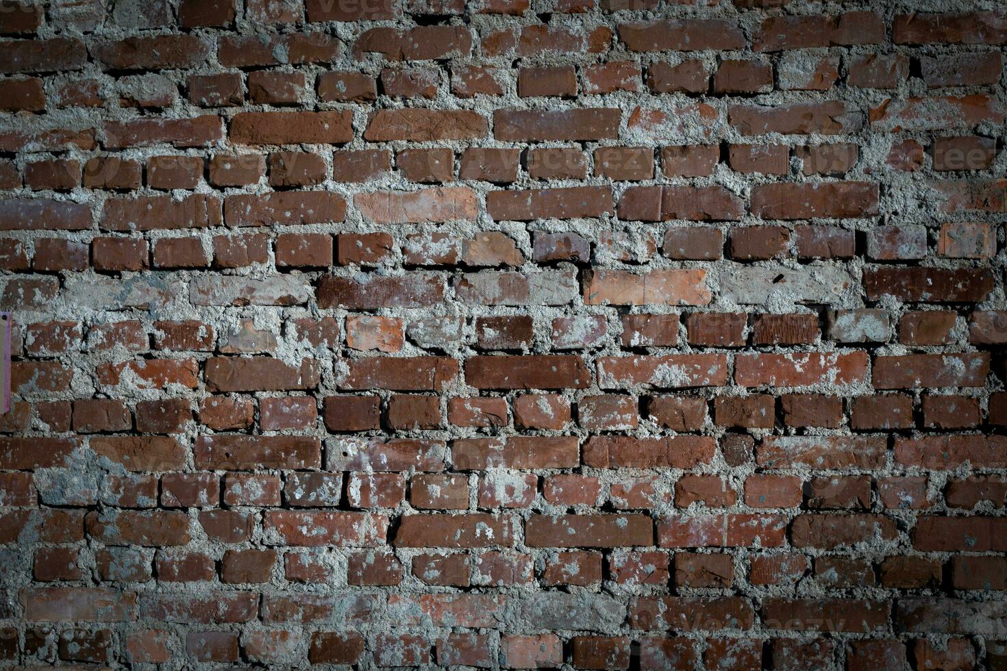 Industrial background of empty grunge brick wall of old abandoned building or industrial warehouse. photo
