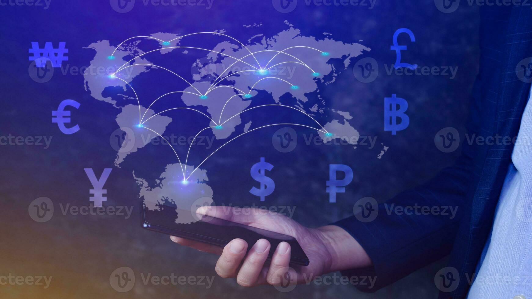 Businessman using mobile phone and laptop computer to money transfers and currency exchanges between countries of the world, online banking interbank payment concept. photo