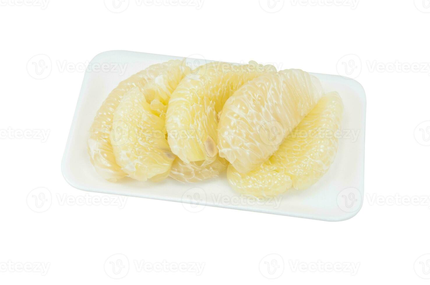 Green pomelo citrus fruit on foam on white background photo