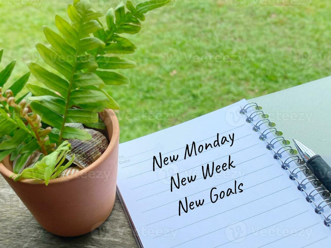Inspirational and Motivational Concept New monday new week new goals text background. Stock