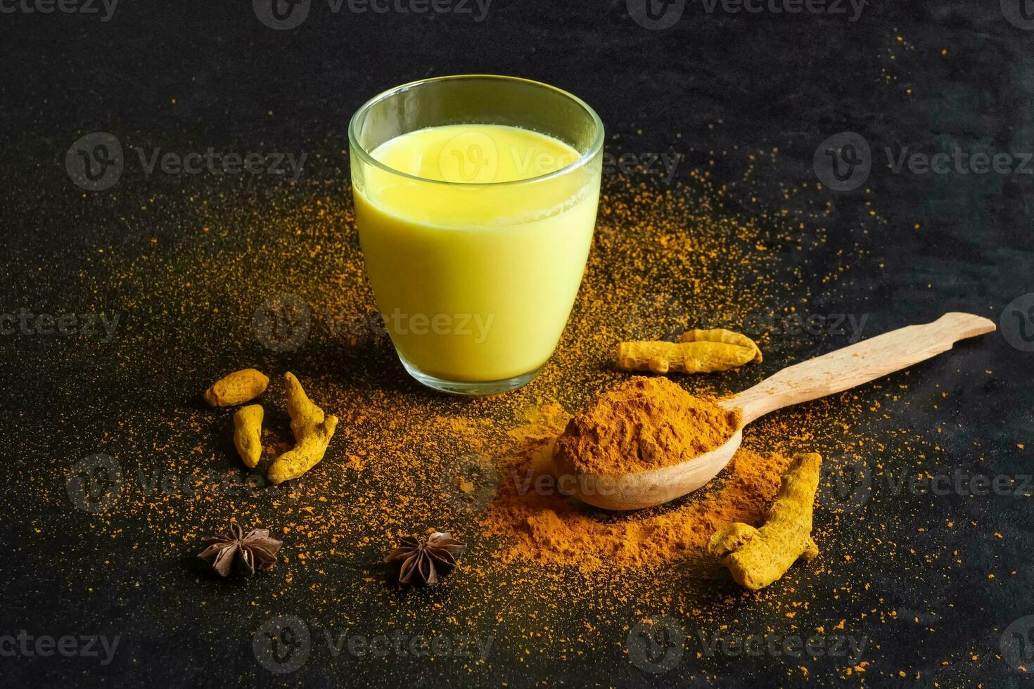 Traditional indian drink turmeric golden milk photo