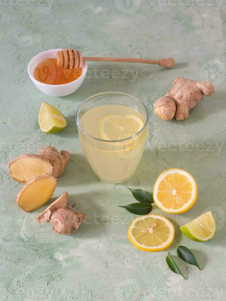 Antiviral drink with lemon, honey and ginger root, strengthening of immunity concept photo