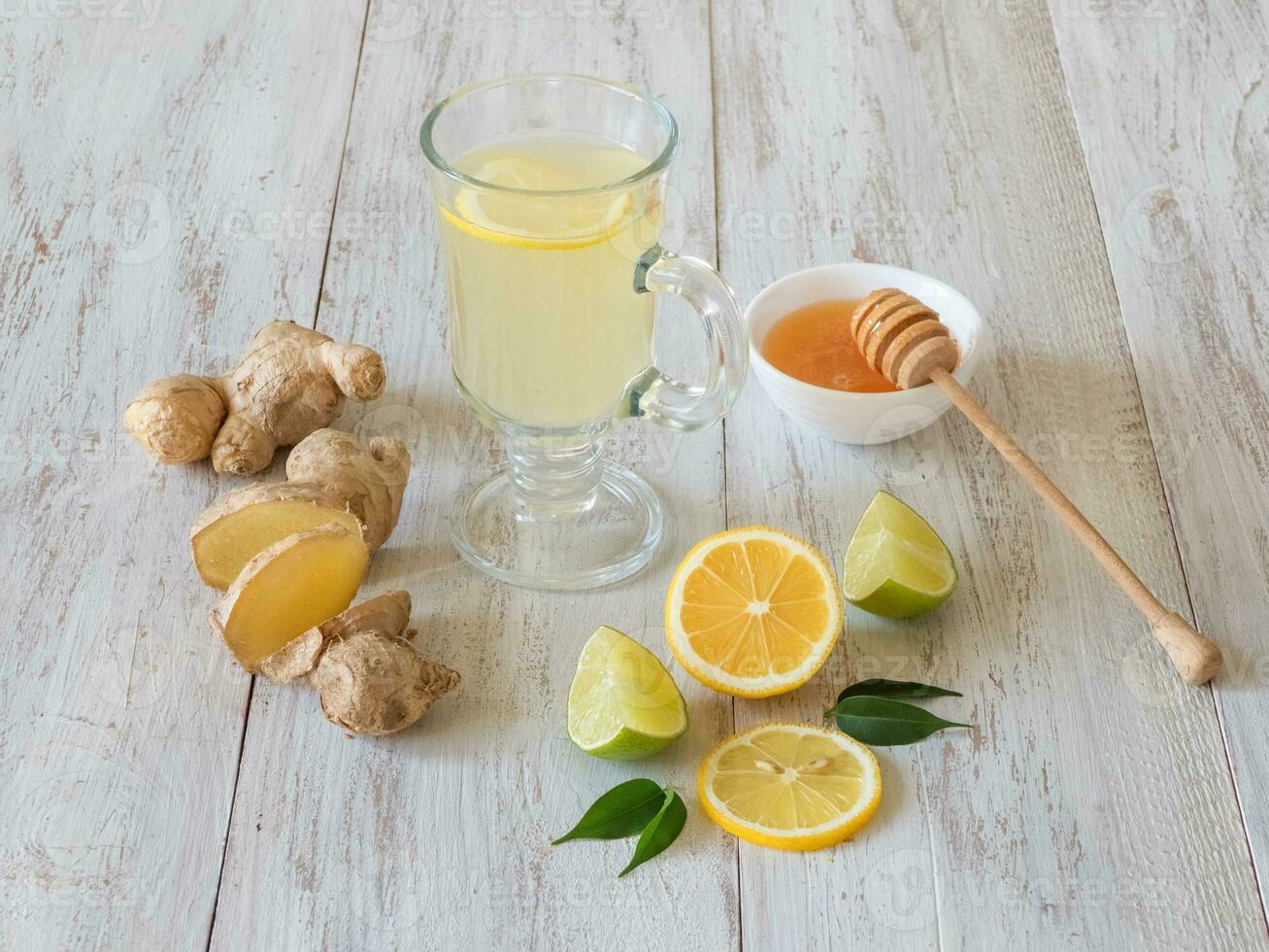 Antiviral drink with lemon, honey and ginger root, strengthening of immunity concept photo