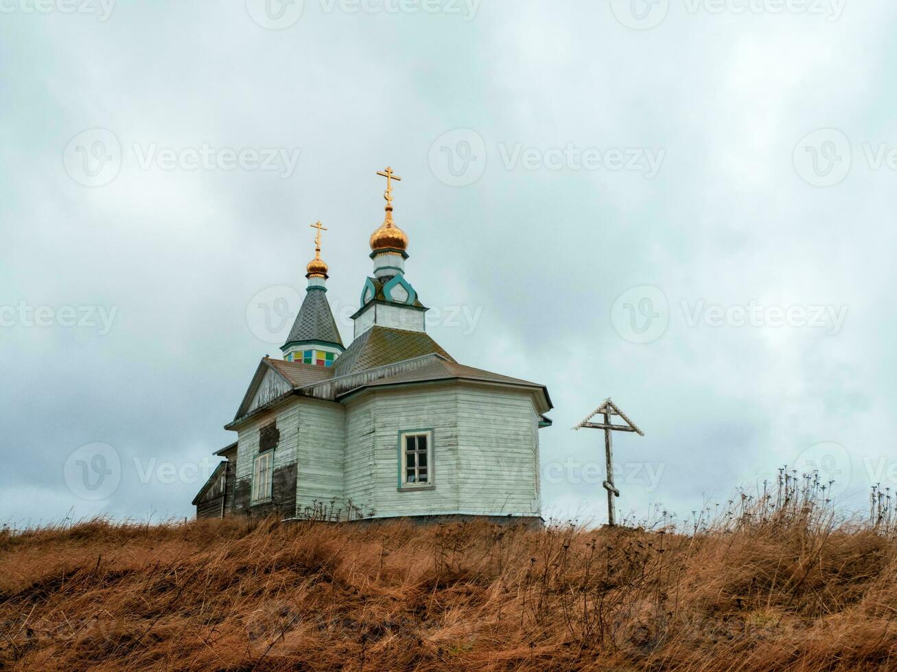 Kashkarantsy Church. A small authentic village on the White sea coast. Kola Peninsula. photo