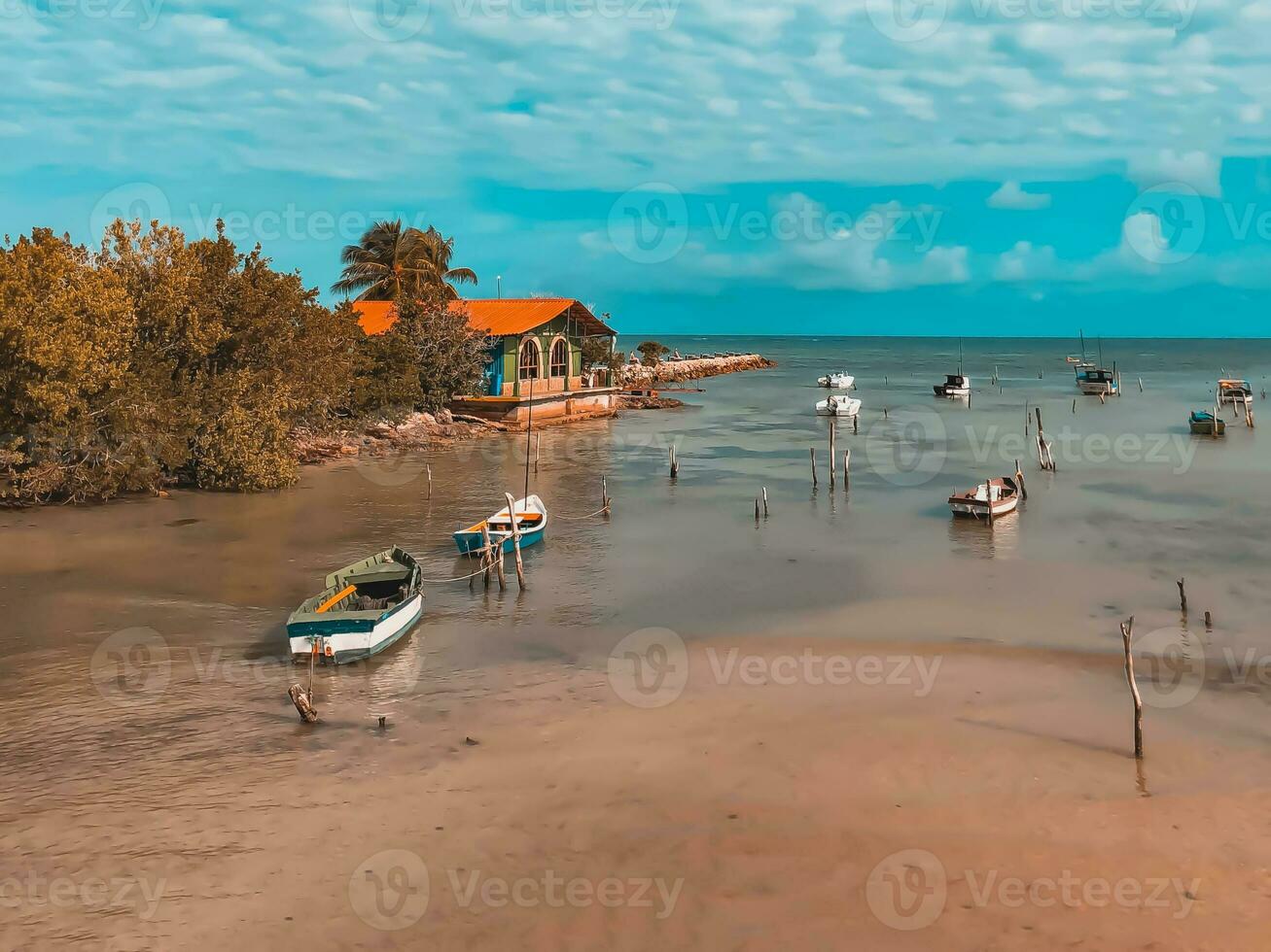 Beautiful landscape with boats at high tide on the sea photo