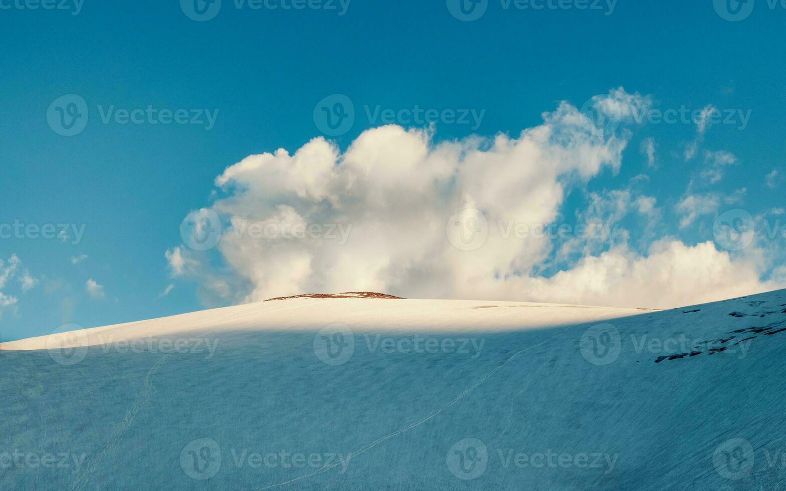 Snow mountain dome. Big snowy mountain. The top of the mountain Dome of three lakes. Altai mountains. photo