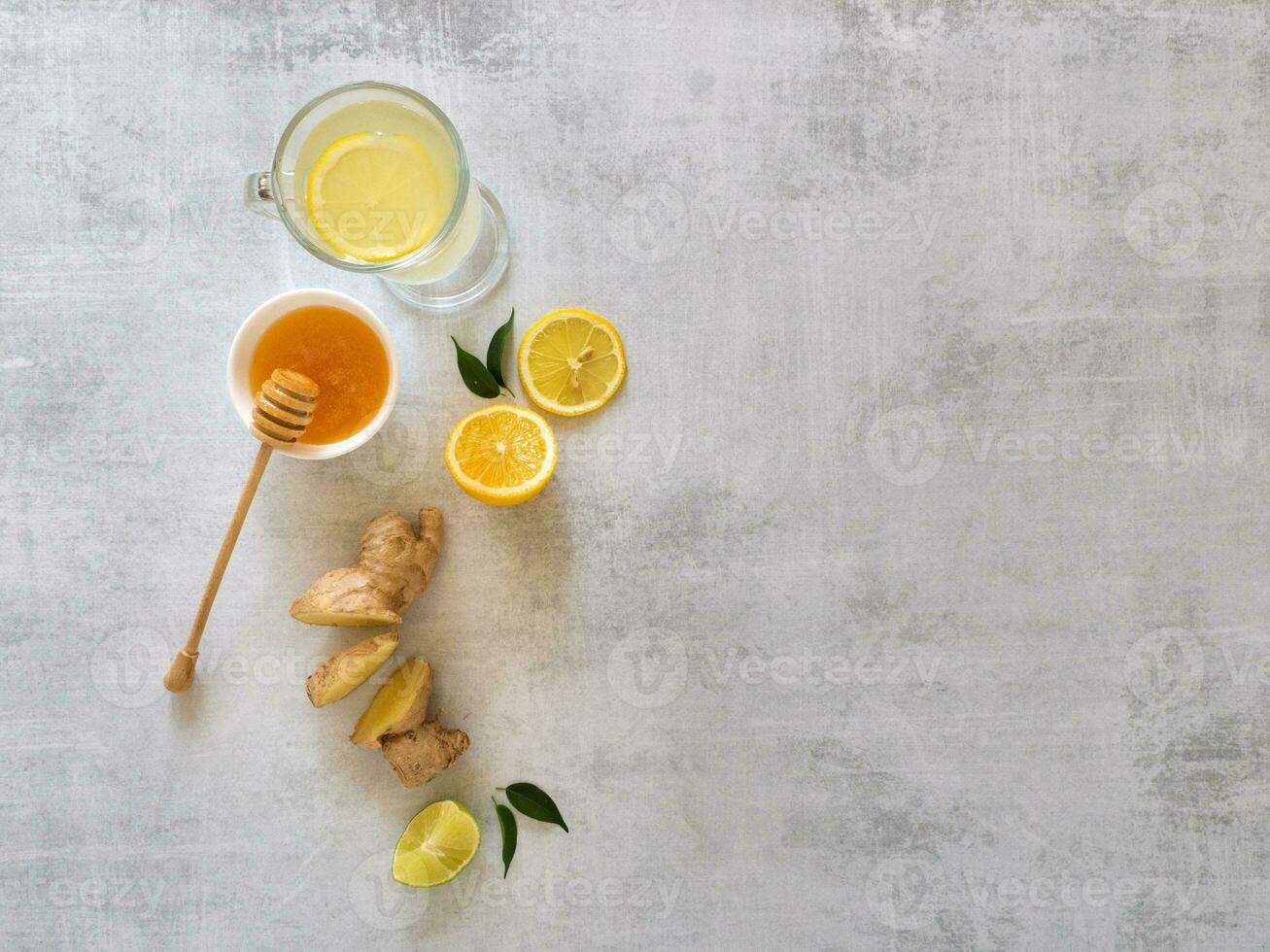 Antiviral drink with lemon, honey and ginger root, health concept, horizontal with copy space photo