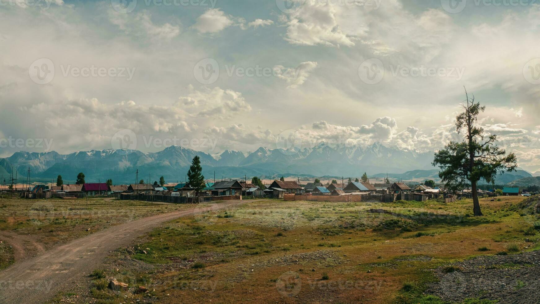 Altai village of Kurai. Panoramic view. Vintage tinting. photo