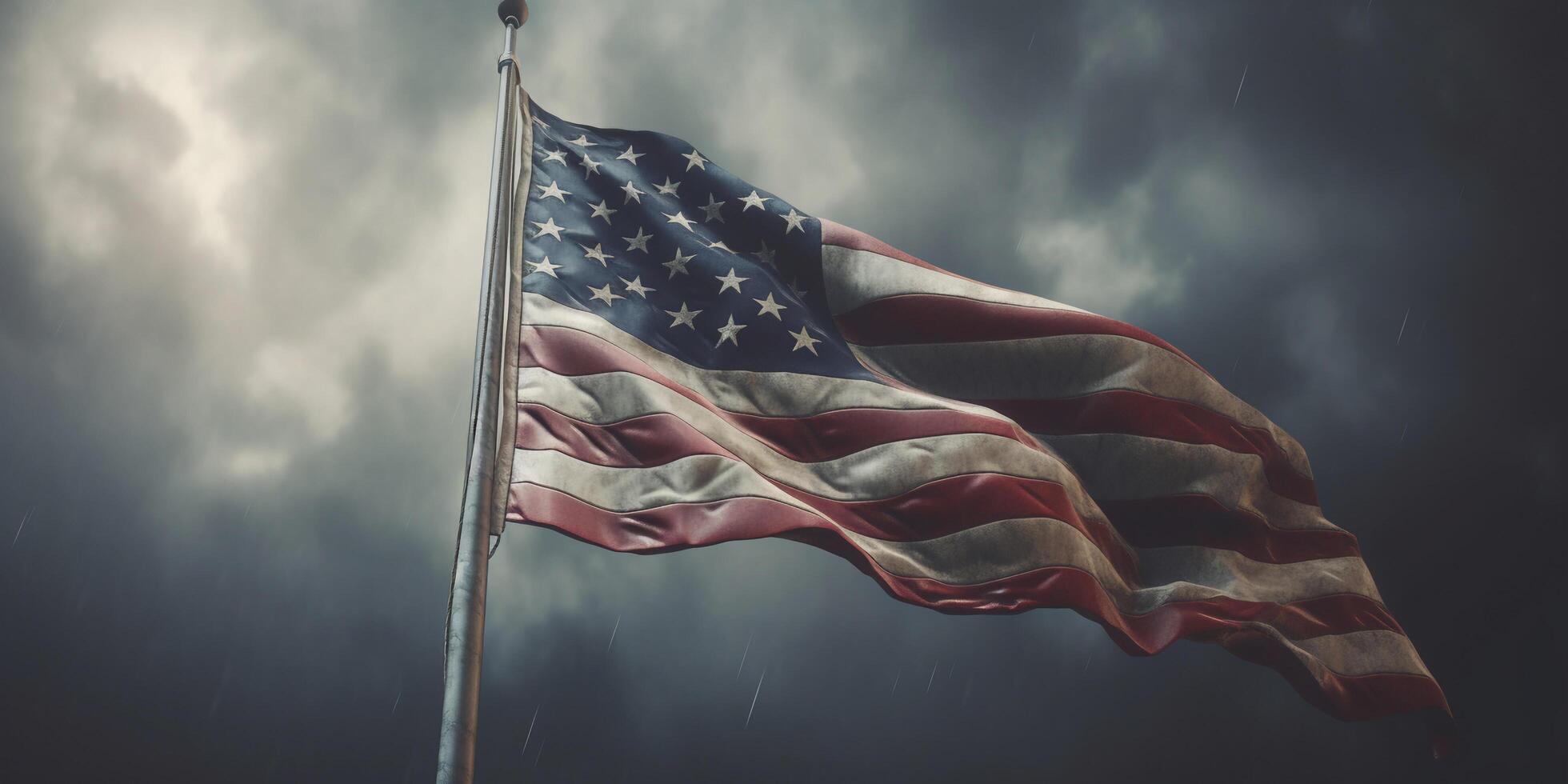 American flag waving in the wind against a stormy sky with . photo