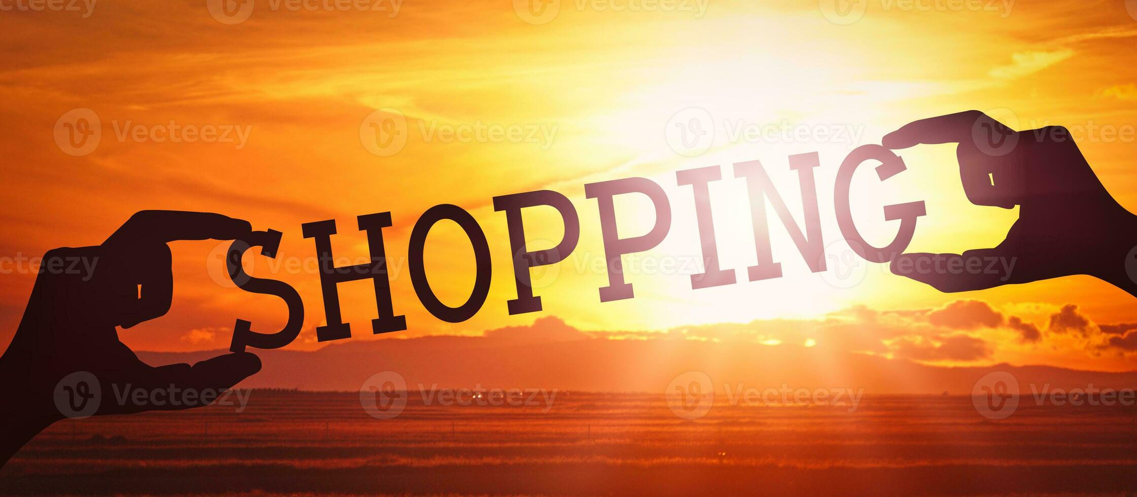 Shopping - Human Hands Holding Black Silhouette Word photo